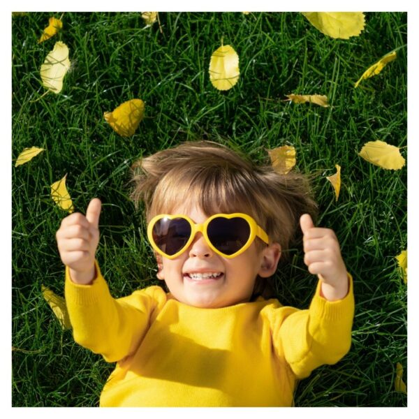 toddler playing on fake grass